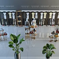 Modern Clothing Store Display Shelves With Hanging Clothes Mannequins Shoes And Green Plants