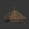 Traditional Conical Thatched Roof Building With Wooden Base And Spire Decoration