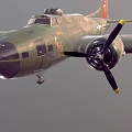 Military Green Fighter Aircraft Flying With Twin Propellers And Aerodynamic Wing Structure