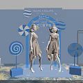 Dreamy Candy Pop-up Store With Models In Beige Dresses And Blue White Lollipop Decorations