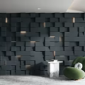 Black 3D Cube Wall Design With Embedded Lighting Green Armchair Marble Table White Plant