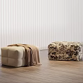 Beige Ottoman with Brown Blanket and Patterned Ottoman on Wooden Floor with White Blinds