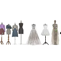 Mannequins Showcasing Various Fashion Clothing Styles Including Dresses Tops And Skirts