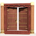 Traditional Wooden Storefront Entrance With Ornate Door Design Golden Accents And Columns
