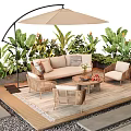 Outdoor Sofa Set With Rattan Chairs Coffee Table And Greenery Under Umbrella On Patio