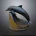 Detailed Leaping Dolphin Sculpture With Wave Textured Base And Metallic Finish