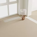 Modern Table Lamp With White Lampshade And Brown Geometric Base In Room Corner