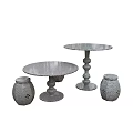 Round Outdoor Table With Stacked Legs And Matching Speckled Stools