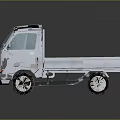 White Small Truck With Open Cargo Bed And Front Grille Design Features