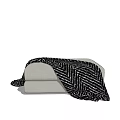 Modern Light Colored Sofa and Coffee Table Set with Black White Herringbone Throw Blanket