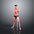 Shirtless Man in Black Underwear Standing with Long Pole Against Gray Background on Black Floor