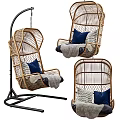 Stylish Rattan Hanging Chair With Blue Cushions And Gray Throw Blanket On Black Metal Stand