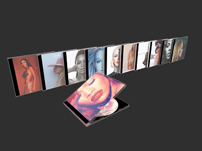 Decorative Ornament Set With Open CD Cases Showcasing Female Images And Discs 3d model