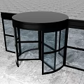 Circular Revolving Door With Black Frame And Glass Panels On Gray Floor