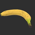 Fresh Ripe Yellow Banana With Black Spots On Dark Background