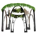 Lush Green Flower Arch With Hanging Vine Plants And Black Metal Frame