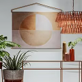 Modern Console Table With Metal Frame Potted Plants Wall Art And Hanging Lamp