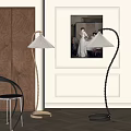 Golden And Black Modern Floor Lamps In Interior With Wall Art And Chair
