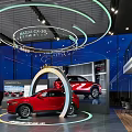 Red Mazda 240 TURBO Showcased in Modern Showroom with Innovative Safety Technology