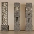 Three Intricately Carved Stone Columns with Geometric and Leaf Inspired Decorative Patterns