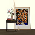 Stylish Wooden Side Table with Metal Legs and Decorative Plants Near Leopard Print Framed Art