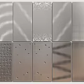 Metallic Wall Panel Design Featuring Various Perforated Patterns And Textured Surfaces