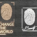 Illuminated Lighting Combinations With Fingerprint Pattern Change The World And Beauty On Wooden Background
