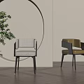 Modern Dining Chairs With Light Upholstery Near Circular Decor And Green Plant On Wooden Floor
