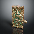 Ornate Bronze Door Handle With Intricate Facial Carvings And Decorative Patterns