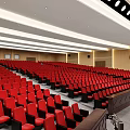 Modern Auditorium With Red Seats And Stage Equipment
