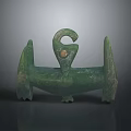 Ancient Green Jade Vessel With Curved Handle Three Legs And Circular Ornament
