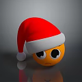 Yellow Emoji Wearing Red Santa Hat With Sad Expression On Dark Surface