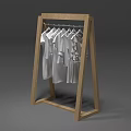 Sturdy Wooden Clothes Rack with Multiple White T-shirts Hanging on