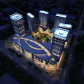 Modern Illuminated Commercial Complex Night View With High Rise Buildings And Central Square
