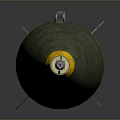 Green Military Bomb With Tail Fins And Yellow Markings On Gray Background