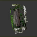 Outdoor Iron Bench With Carved Design Stone Structure And Green Mossy Surroundings