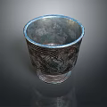 Intricate Carved Silver Cup With Traditional Sculptural Patterns And Artistic Designs