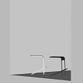 Modern Minimalist Bar Stools In Silver And Black With Sleek Metal Frame Against White Background