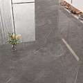 Gray Marble Floor Tiles With Polished Surface In Entrance With Shoe Cabinet And Decorative Plants