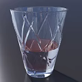 Elegant Transparent Wine Glass With Diamond Cut Pattern And Red Liquid On Dark Background