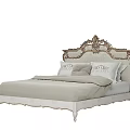 Classic European Style Double Bed With Ornate Carved Headboard Light Colored Bedding And Patterned Details