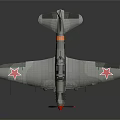 Vintage Military Airplane Model With Camouflage Paint Red Stars On Wings And Red Nose