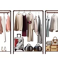 Fashionable Clothes Display On Hanging Racks With Luggage And Bags