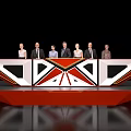 Seven People Standing On Unique Geometric Stage With Red And White Design