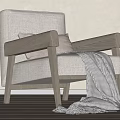 Modern Accent Chair With Wooden Armrests And Fabric Seat With Thrown Blanket