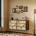 Entryway Sideboard Cabinet with Decorative Vase Books Framed Pictures Near Floor Lamp and Window Blinds