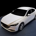 White Mazda Sedan Featuring Modern Sleek Body And Alloy Wheels On Blue
