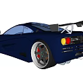 Deep Blue Sports Car Featuring Sleek Aerodynamic Design Large Alloy Wheels And Rear Spoiler