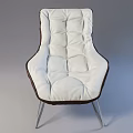 Modern White Padded Lounge Chair with Dark Trim Metal Legs and Matching Ottoman