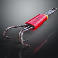 Heavy Duty Metal Claw Hardware Tool With Red Handle And Rusted Metal Prongs
